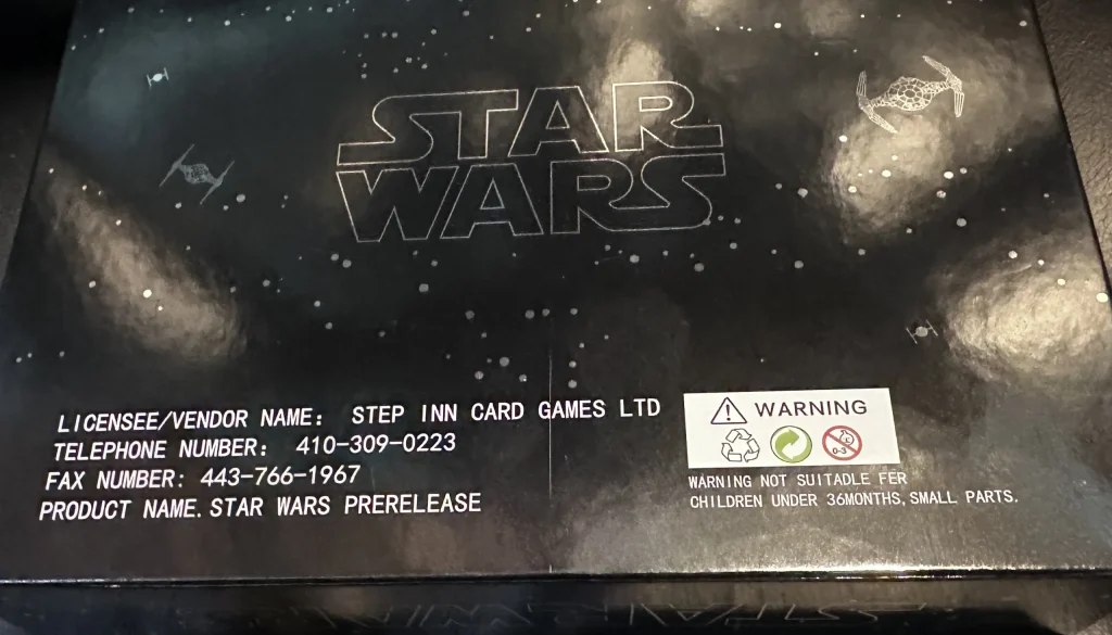 Back of the box of star wars pre release trading cards