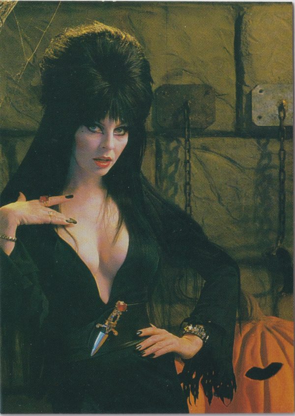 Elvira 48 of 72 front of the trading card from her Mistress of the Dark set released by Comic Images in 1996
